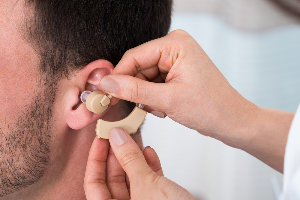 használjon hallókészüléket