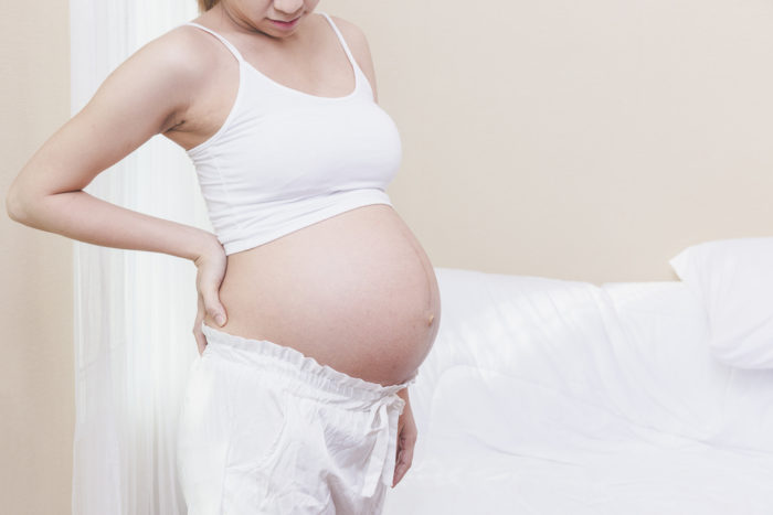 hátfájás a terhesség alatt a fűtőpad használatával